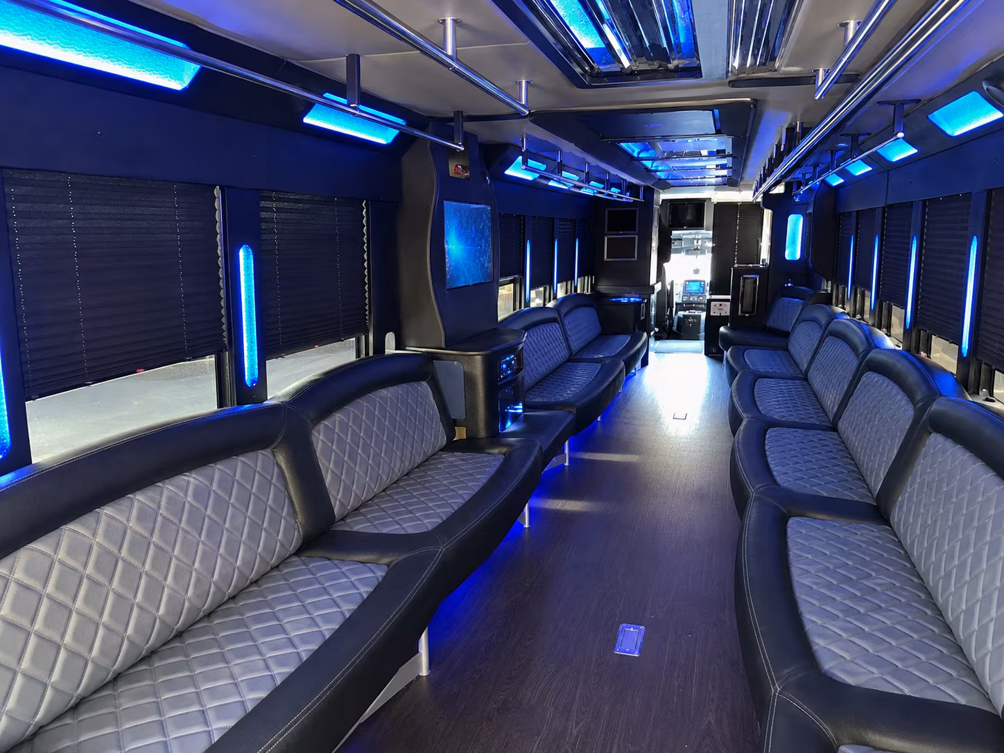 Wedding guests seated inside a party bus serving Bridgeport